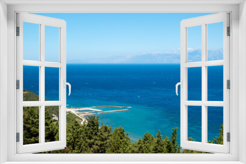 Fototapeta Naklejka Na Ścianę Okno 3D - Stunning view down to the sea and the surrounding area from top of the mountain in Mathraki island, Greece