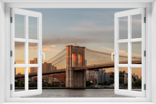 Fototapeta Naklejka Na Ścianę Okno 3D - Brooklyn bridge is one of the oldest suspension bridge in USA. Connecting Manhattan with Brooklyn. Two levels bridge. Lower level it has for cars and public transport, upper for walkers.