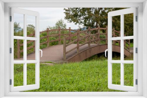 Fototapeta Naklejka Na Ścianę Okno 3D - wooden bridge in the park