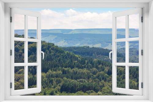 Fototapeta Naklejka Na Ścianę Okno 3D - Green forest in the mountains in summer. View from above