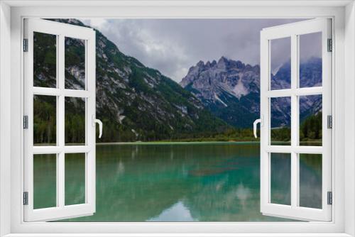 Fototapeta Naklejka Na Ścianę Okno 3D - Lago di Braies, also known as Pragser Wildsee, is a breathtaking alpine lake nestled in the heart of the Dolomites, a UNESCO World Heritage site in northern Italy.