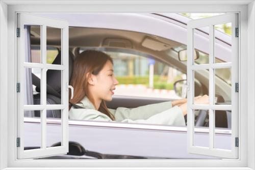 Transport, happy smile brunette hair asian young woman hand holding steering wheel driving car, vehicle for travel trip, sits on driver seat, female with fasten safety seat belt before traveling.