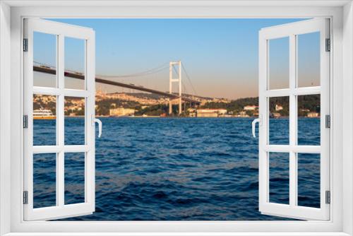 Fototapeta Naklejka Na Ścianę Okno 3D - Istanbul Bosphorus Bridge or 15 July Martyrs Bridge on a sunny summer day with the deep blue sea