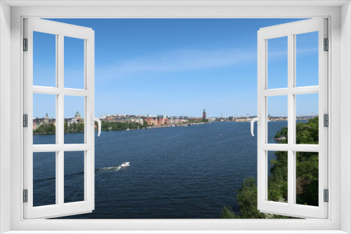 Fototapeta Naklejka Na Ścianę Okno 3D - View over the water on Stockholms city hall