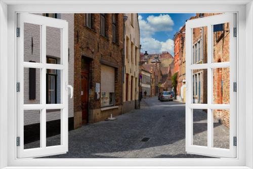 Fototapeta Naklejka Na Ścianę Okno 3D - Old cozy street of the historic city center of Bruges (Brugge), West Flanders province, Belgium. Cityscape of Bruges.
