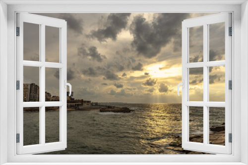 Fototapeta Naklejka Na Ścianę Okno 3D - Spectacular sunset sky with clouds in Alexandria Egypt
