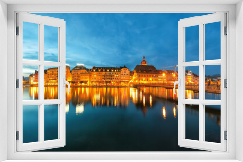 Fototapeta Naklejka Na Ścianę Okno 3D - Beautiful historic city center of Lucerne with famous buildings and promanade during night..