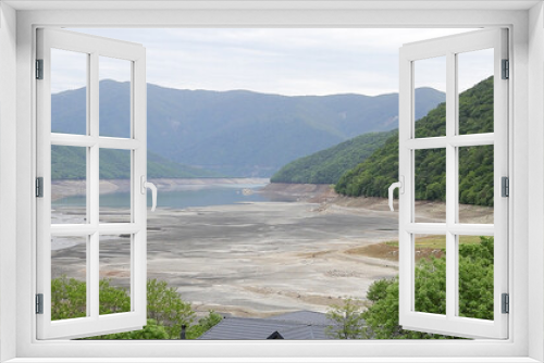 Fototapeta Naklejka Na Ścianę Okno 3D - View of dry Zhinvali reservoir from Ananuri fortress in Georgia.