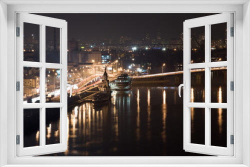 Fototapeta Naklejka Na Ścianę Okno 3D - Night city view with the river, road, buildings and lights. Kyiv