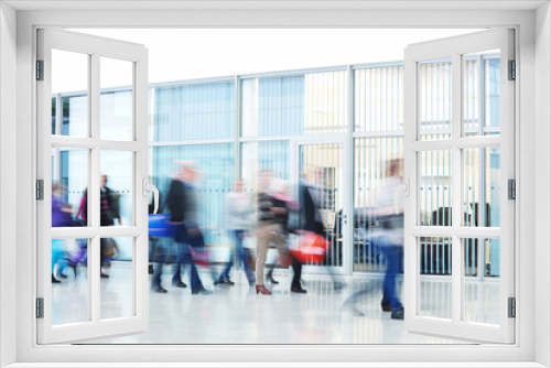 People Rushing through Corridor, Motion Blur