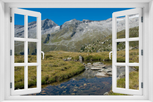 Fototapeta Naklejka Na Ścianę Okno 3D - View of a little stream in the Zillertal alps in South Tyrol, Italy