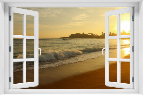 Fototapeta Naklejka Na Ścianę Okno 3D - Beach with golden sand and blue ocean water on most popular Unawatuna