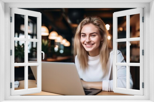 Portrait of Beautiful European Female Student Learning Online in Coffee Shop, Young Woman Studies with Laptop in Cafe, Doing Homework