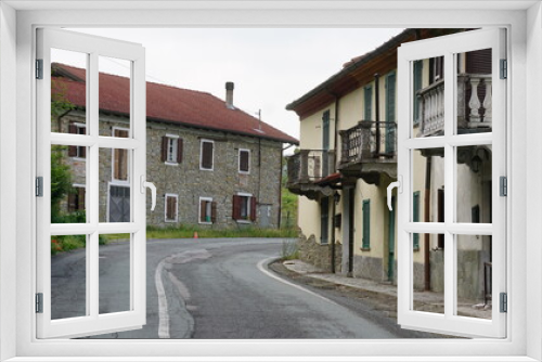 Fototapeta Naklejka Na Ścianę Okno 3D - Houses close to Cartosio in Italy, in the month of May