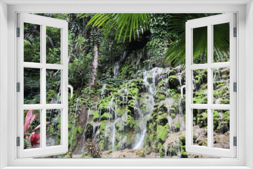 Fototapeta Naklejka Na Ścianę Okno 3D - Waterfall in Malili, South Sulawesi, Indonesia. Waterfall natural background with smooth water flow movement.