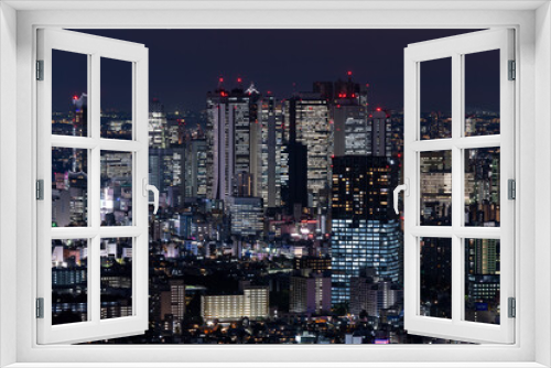 Fototapeta Naklejka Na Ścianę Okno 3D - Tokyo Shinjuku area high rise buildings at dusk.