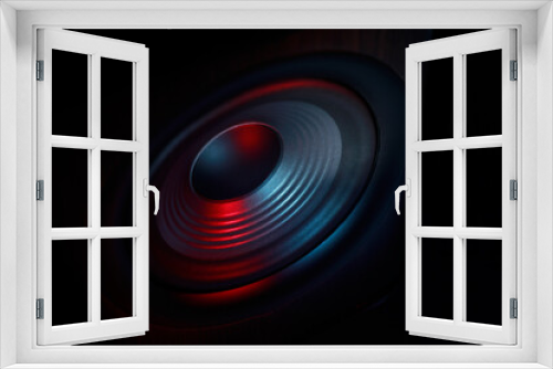 Fototapeta Naklejka Na Ścianę Okno 3D - One sound speaker in neon light on black background, closeup