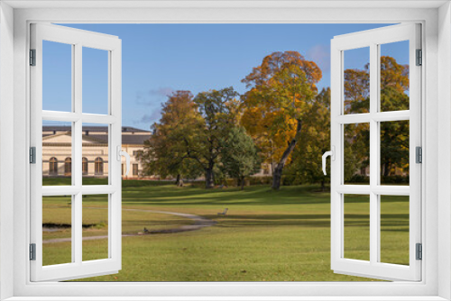 Fototapeta Naklejka Na Ścianę Okno 3D - Park view on the island Drottningholm, a sunny colorful autumn day in Stockholm