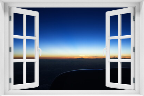 Fototapeta Naklejka Na Ścianę Okno 3D - Sunrise from Airplane Window - 飛行機からの景色 朝日