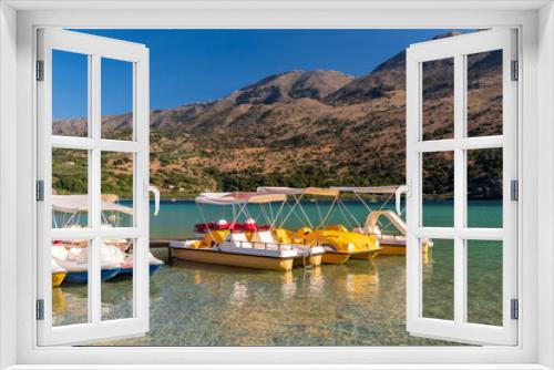 Fototapeta Naklejka Na Ścianę Okno 3D - Water bikes on lake Kournas, Crete, Greece