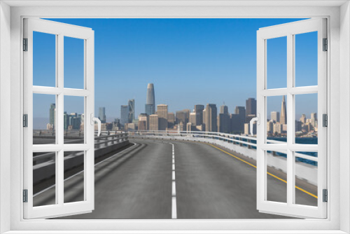 Fototapeta Naklejka Na Ścianę Okno 3D - Empty urban asphalt road exterior with city buildings background. New modern highway concrete construction. Concept way to success. Transportation logistic industry fast delivery. San Francisco. USA.