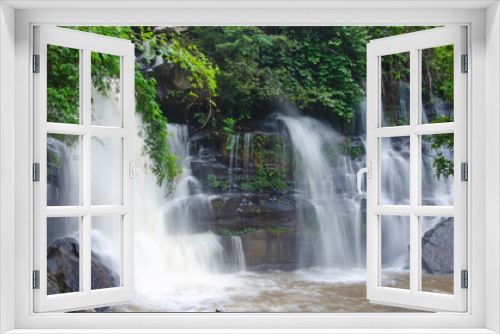 Fototapeta Naklejka Na Ścianę Okno 3D - Beautiful white water lines of waterfall and trees on cliff
