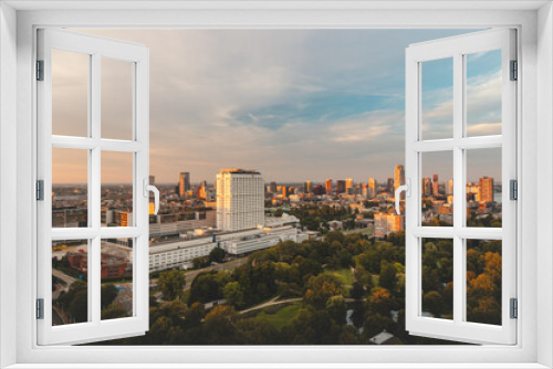 Sunset over Rotterdam city centre and its surrounding park. Sunset in one of the most modern cities in the Netherlands