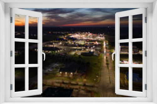 Fototapeta Naklejka Na Ścianę Okno 3D - Evening traffic during twilight over Brannon crossing road between Lexington and Nicholasville in Kentucky