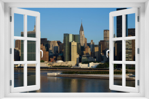 Fototapeta Naklejka Na Ścianę Okno 3D - New York City Midtown Skyline with United Nations-16