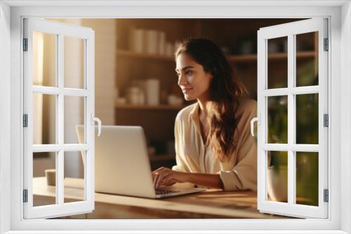 young woman with laptop in cafe