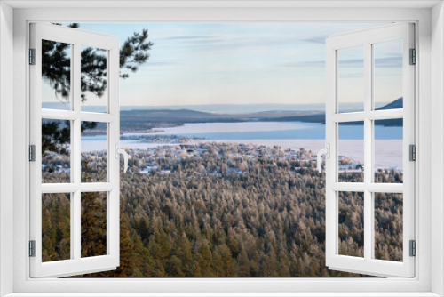 Fototapeta Naklejka Na Ścianę Okno 3D - Winter landscape of the town of Jukkasjarvi, Sweden. Situated in the north of Sweden in Kiruna municipality.