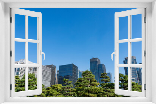 Fototapeta Naklejka Na Ścianę Okno 3D - 東京　大手町・丸の内のオフィスビル群の風景