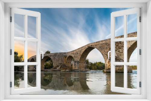 Fototapeta Naklejka Na Ścianę Okno 3D - The historical Aspendos Bridge over Koprucay at sunrise in Antalya Turkey