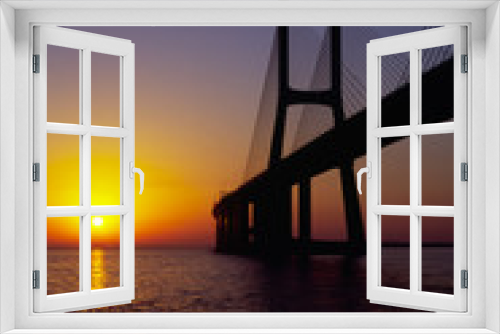 Fototapeta Naklejka Na Ścianę Okno 3D - Vasco da Gama Bridge at sunrise