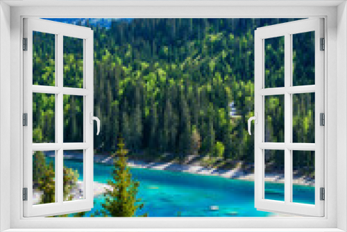 Fototapeta Naklejka Na Ścianę Okno 3D - Small island in the middle of Cauma Lake (Caumasee) with crystal blue water in beautiful mountain landscape scenery at Flims, Graubuenden - Switzerland