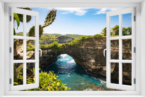 Fototapeta Naklejka Na Ścianę Okno 3D - The spectacular phenomenon of a natural bridge between the bay and the ocean at Broken beach on the island of Nusa Penida near Bali, Indonesia