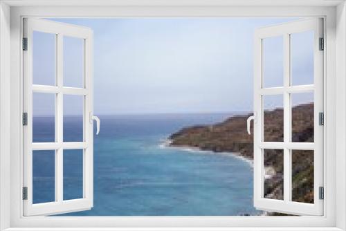 Fototapeta Naklejka Na Ścianę Okno 3D - Scenic view of the ocean coastline of Saint George Beach in Ikaria, Greece.