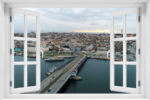 Fototapeta Naklejka Na Ścianę Okno 3D - aerial view of Galata Bridge overlooking Bosphorus and city. Movement of cars, boats and ships. Istanbul, Turkey. 