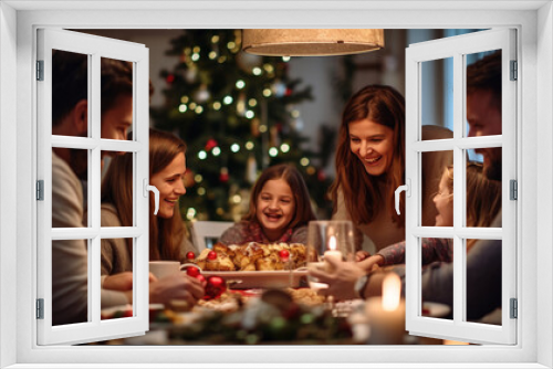 Family enjoying a warm, festive Christmas dinner together, with children smiling, candles glowing, and a decorated Christmas tree in the background.