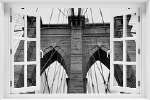 Fototapeta Naklejka Na Ścianę Okno 3D - Monochromatic image of the iconic Brooklyn Bridge in New York City, USA
