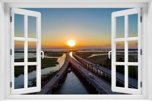 Fototapeta Naklejka Na Ścianę Okno 3D - Aerial view of Mobile Bay at sunset