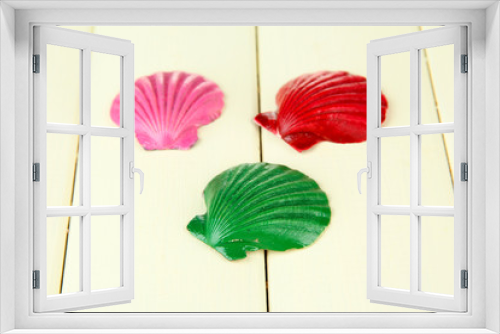 Fototapeta Naklejka Na Ścianę Okno 3D - Colorful seashell on color wooden background