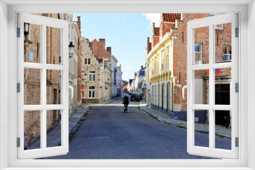 Fototapeta Naklejka Na Ścianę Okno 3D - Bruges Belgium - 08 01 2023: Historic city center of Brugge, West Flanders province. Ancient medieval architecture of Bruges old town. Canals and stone paving streets cityscape with famous Burg Berg
