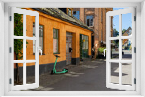 Fototapeta Naklejka Na Ścianę Okno 3D - An orange house in Limhamn Sweden