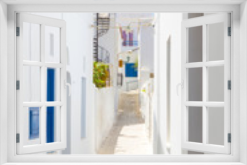 Fototapeta Naklejka Na Ścianę Okno 3D - the town with white houses in Tinos Island,Greece