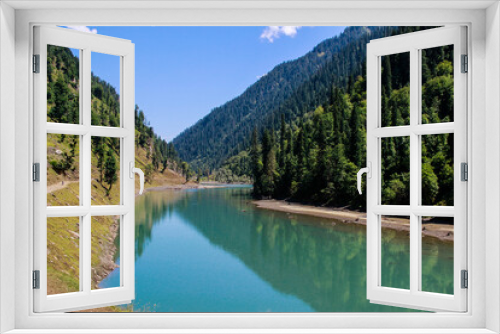 Fototapeta Naklejka Na Ścianę Okno 3D - Picture of Mountain, Trees, River and Stream of adjoining areas of Kashmir. In this picture you can see the hill view along with stream and trees with beautiful scene of greenery on mountains