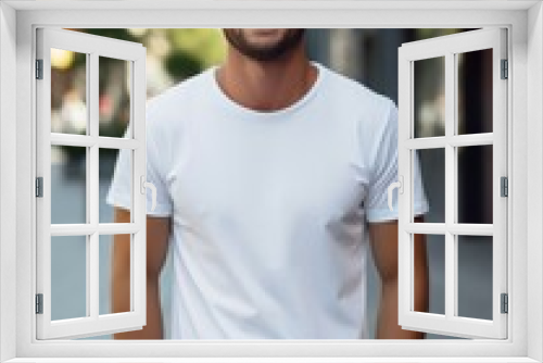 a man in white tshirt smiling and looking at the camera for Mockup tshirt