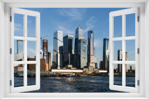 Fototapeta Naklejka Na Ścianę Okno 3D - New York midtown at daylight, panoramic view on skyscrapers and river
