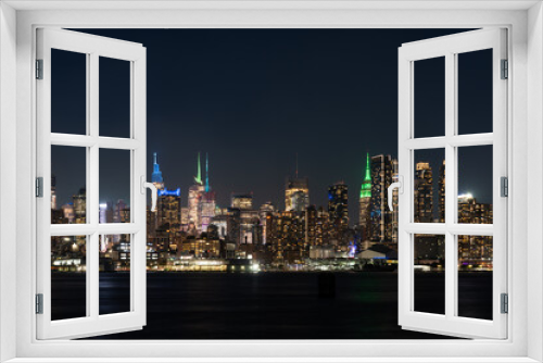 Fototapeta Naklejka Na Ścianę Okno 3D - New York Hudson Yards skyline at night with lights, panoramic skyscrapers
