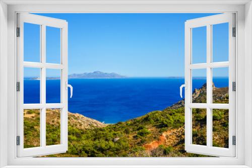 Fototapeta Naklejka Na Ścianę Okno 3D - View of the landscape and the Mediterranean Sea from a mountain on the Greek island of Kos.	